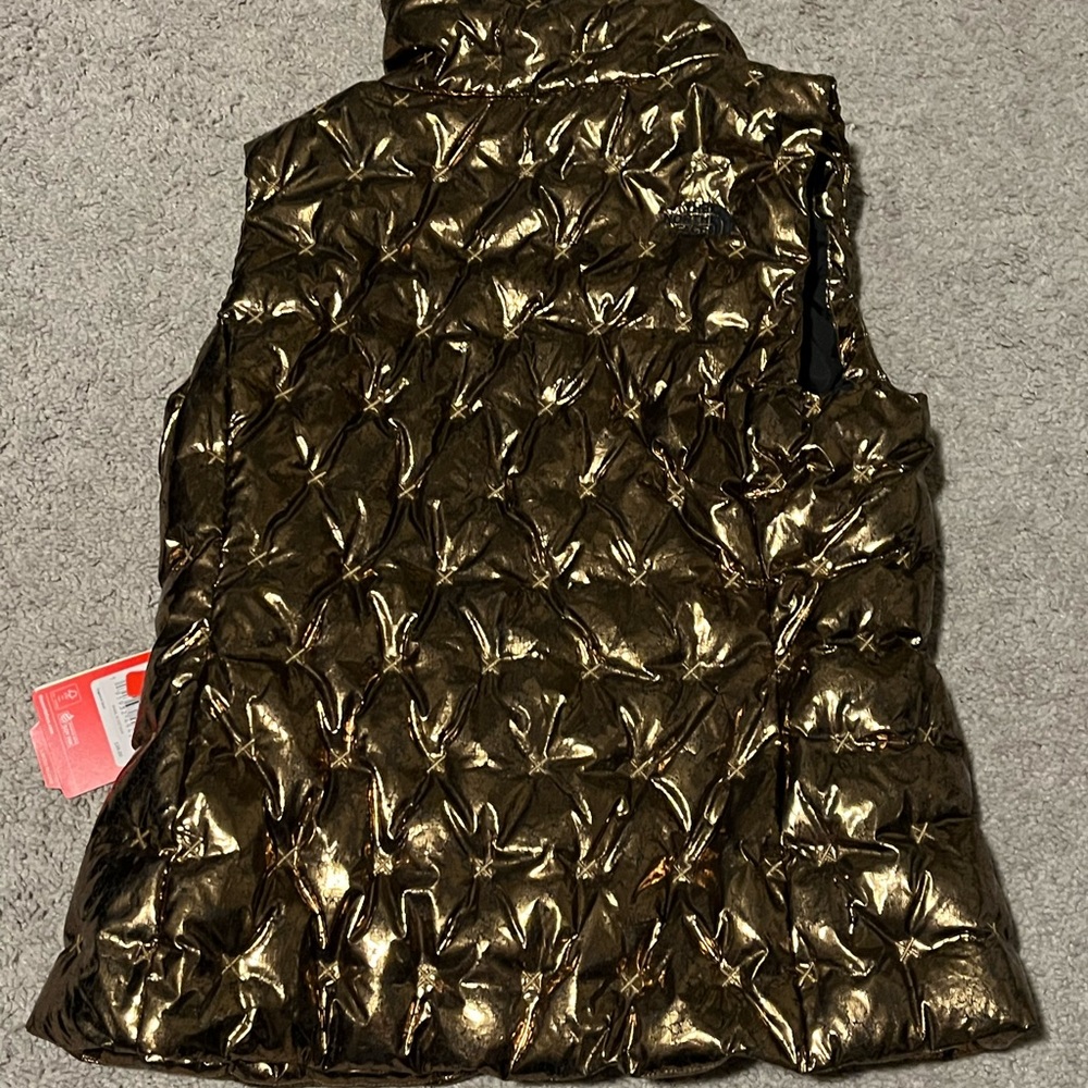 The North Face Hollidown Urban Explorer winter puffer vest women metallic copper - Picture 2 of 13